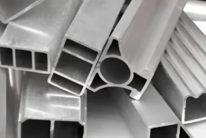 Stack of finished aluminum profiles with complex cross-sections