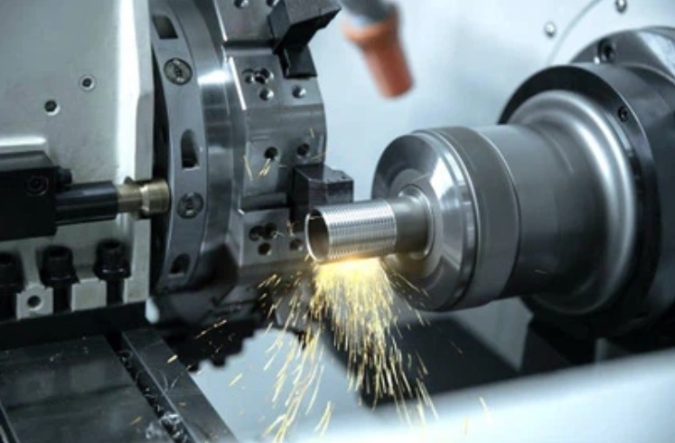 Grinding machine threading metal workpiece with sparks