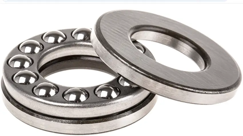 Thrust ball bearing with visible steel balls in raceway and separate thrust washer ring